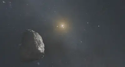 Esta ilustración artística muestra un objeto del Cinturón de Kuiper situado en el borde exterior de nuestro sistema solar, a unos 6&thinsp;000 millones de kilómetros del Sol. Fuente: https://webbtelescope.org/resource-gallery/articles/pagecontent/filter-articles/how-does-webb-study-our-solar-system.html.